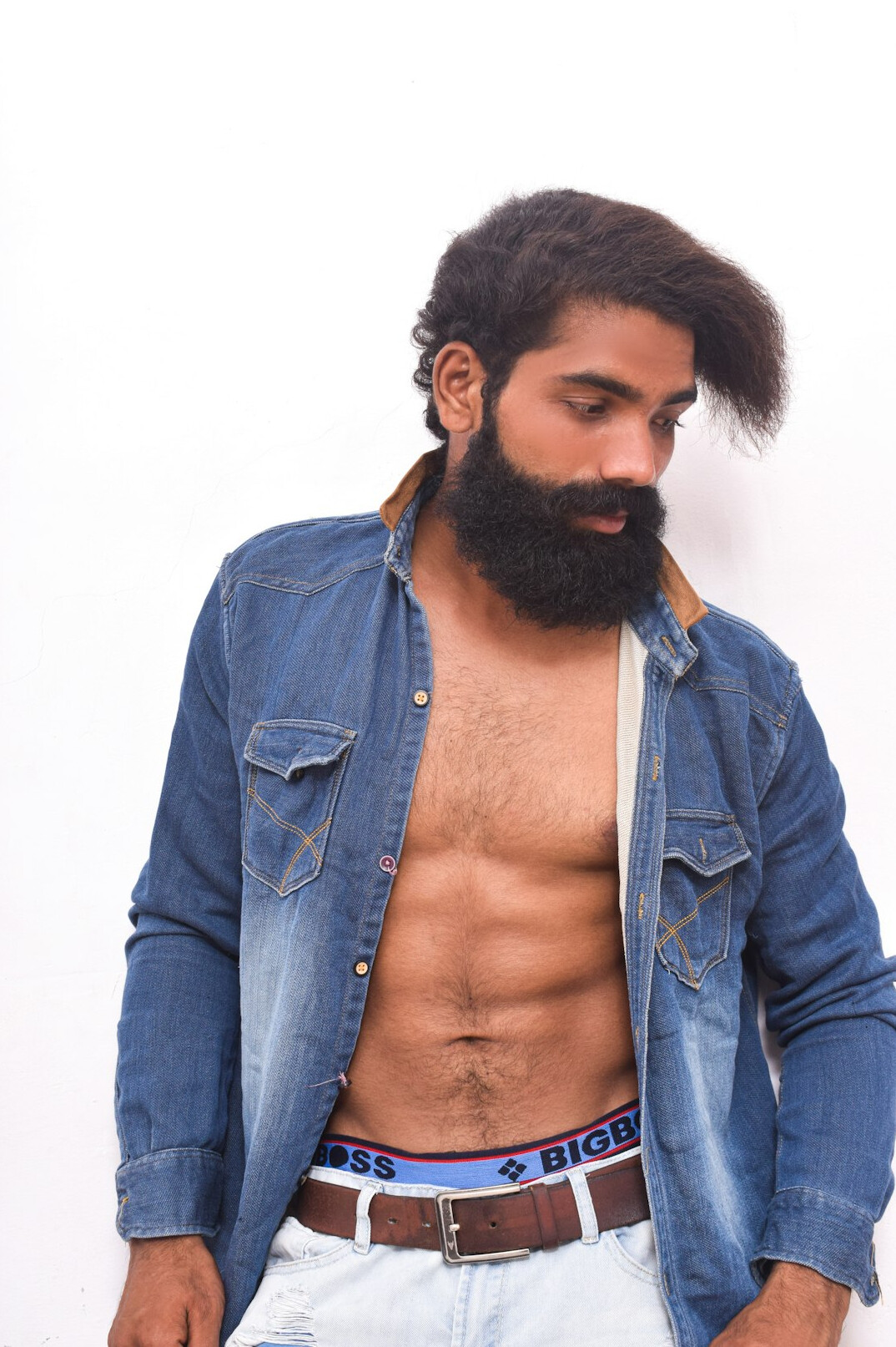 Portrait of a bearded man in casual shirt
