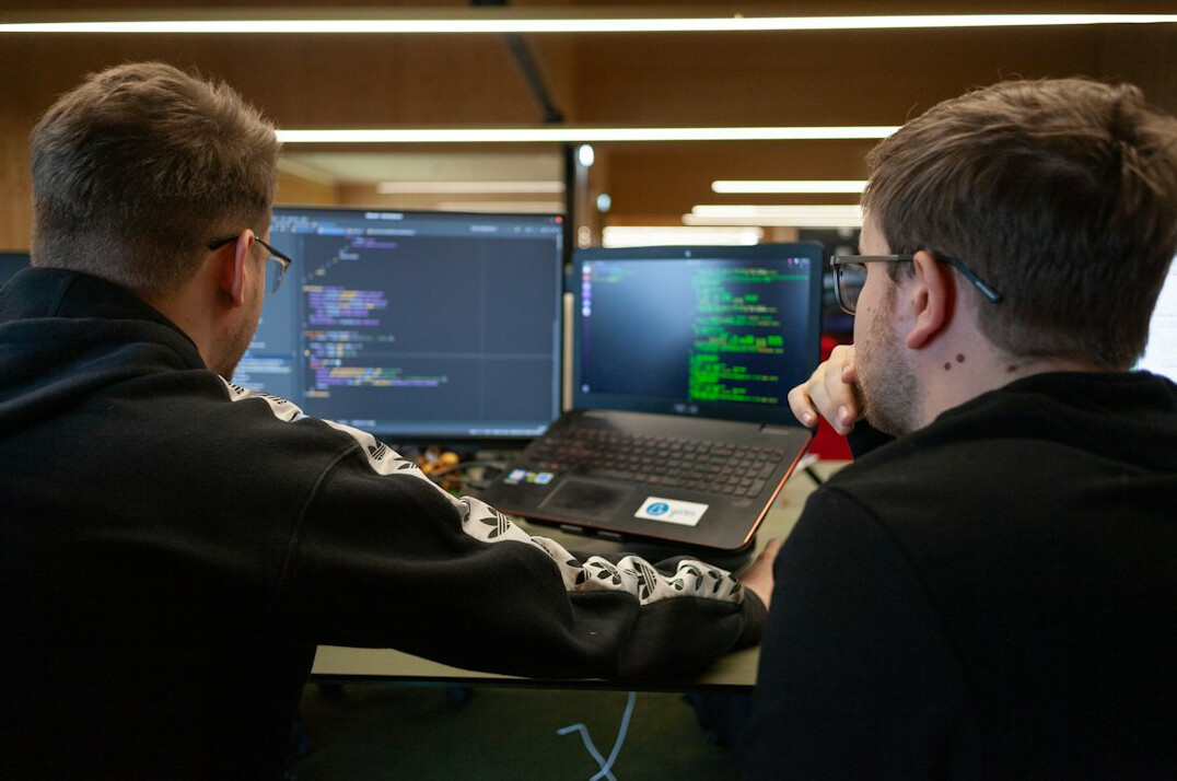 software developers discussing project